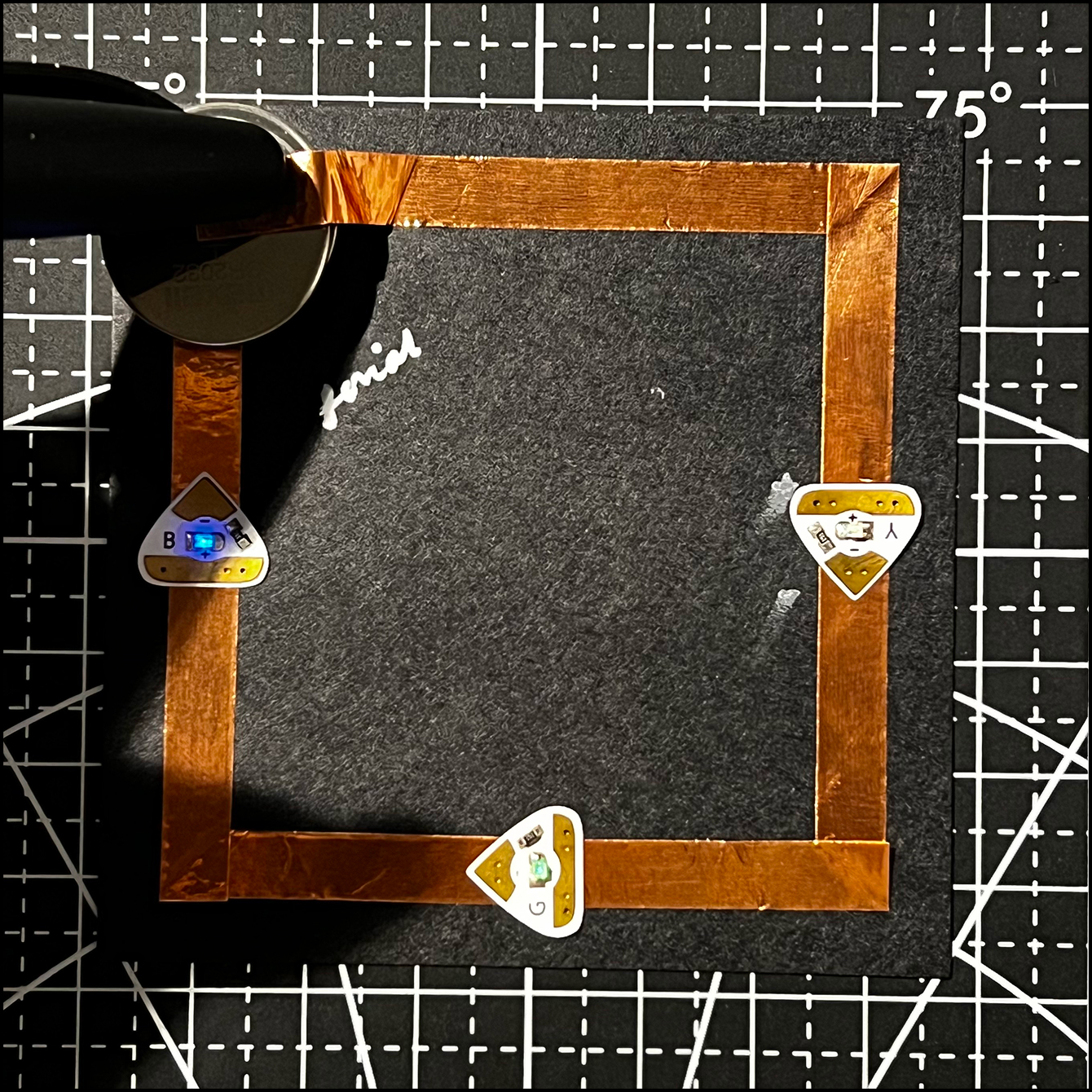 Serial circuit with a switch. I used two batteries as the parallel circuit with the three lights worked when I used the two, however in the serial circuit, not all three lit up.