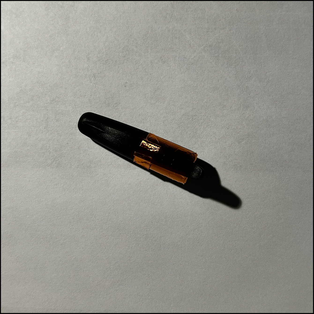 Copper tape and placed on the cap.